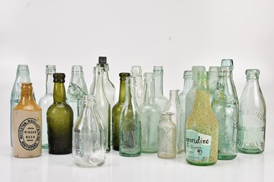 Lot 499 - A collection of bottles and Codd bottles, some...