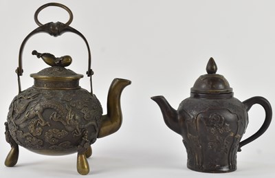 Lot 1081 - An early 20th century Chinese bronze teapot,...