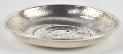 Lot 1160 - A Chinese white metal circular coin set pin...