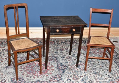 Lot 1630 - A late 18th century oak side table with plank...