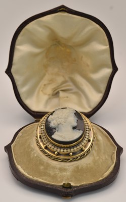 Lot 1381 - A good Victorian yellow metal oval mourning...