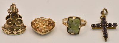 Lot 1185 - A Victorian yellow metal heart shaped mourning...