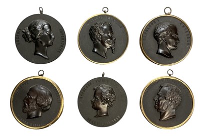 Lot 662 - A set of six Victorian bois durci circular...