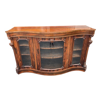 Lot 126 - A Victorian carved rosewood serpentine fronted...