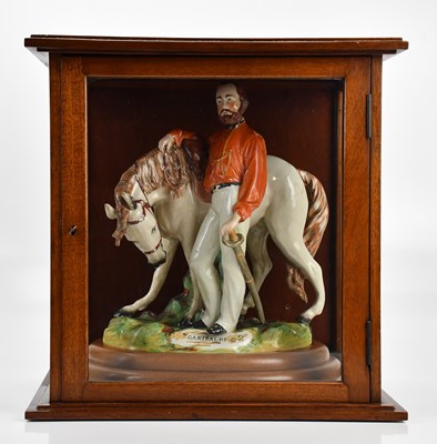 Lot 1244 - STAFFORDSHIRE; a 19th century ceramic figure, '...