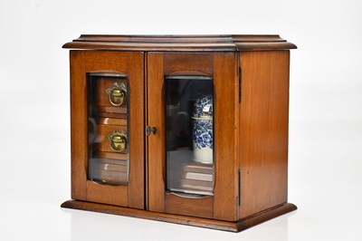 Lot 474 - A late Victorian mahogany smoker's cabinet...