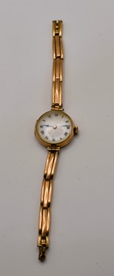 Lot 706 - A 9ct flexi strap lady's watch on a 9ct gold...