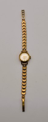 Lot 708 - ORISA; a 9ct gold lady's 17 jewels wristwatch...