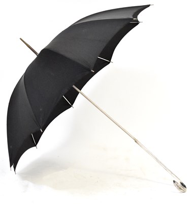 Lot 539 - A white metal handled parasol, with engraved...