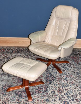 Lot 2608 - A cream leather Model Team chair and stool.