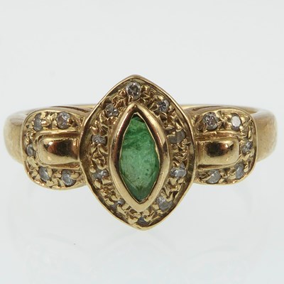 Lot 956 - A 9ct gold Art Deco style emerald and diamond...