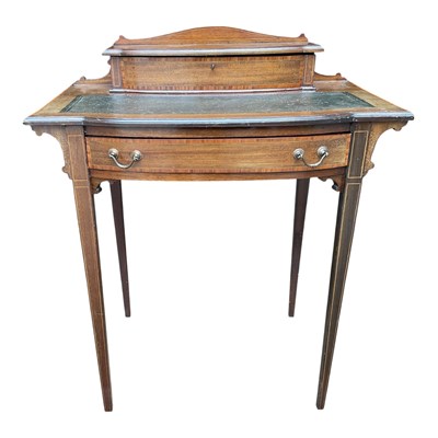 Lot 198 - An Edwardian inlaid mahogany writing table...