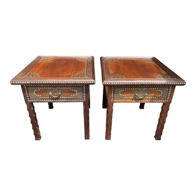 Lot 104 - A pair of reproduction hardwood coffee tables,...