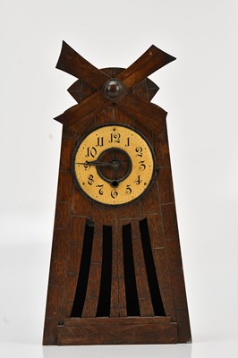 Lot 359 - An oak cased mantel clock in the form of a...