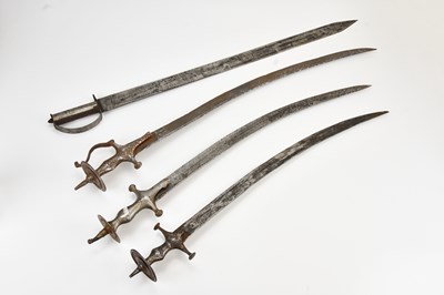 Lot 619 - A group of four tulwars, largest 89cm (4).