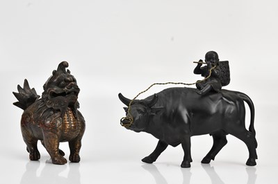 Lot 1174 - A reproduction base metal figure of child...