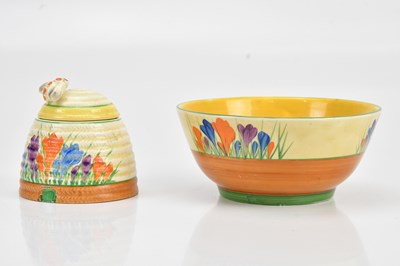 Lot 338 - CLARICE CLIFF; a beehive honey pot and cover,...