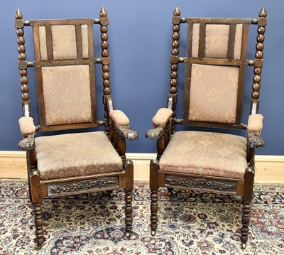 Lot 1593 - A pair of Victorian carved oak hall chairs,...