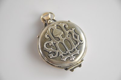 Lot 167 - A sterling silver portable wafer holder from a...