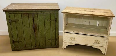Lot 840 - A painted pine twin door cupboard enclosing a...