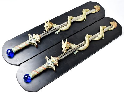 Lot 636 - A pair of modern Chinese decorative swords,...