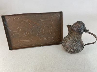 Lot 745 - An Art Noveau copper tray with pressed design,...