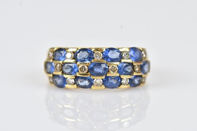 Lot 412 - A diamond and sapphire twenty-seven stone...