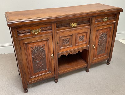 Lot 254 - An Edwardian walnut carved sideboard, height...