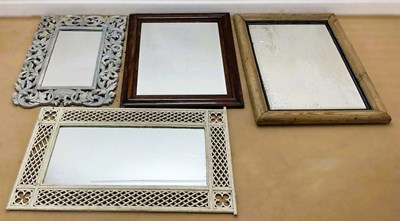 Lot 833 - A collection of four wall mirrors, to include...