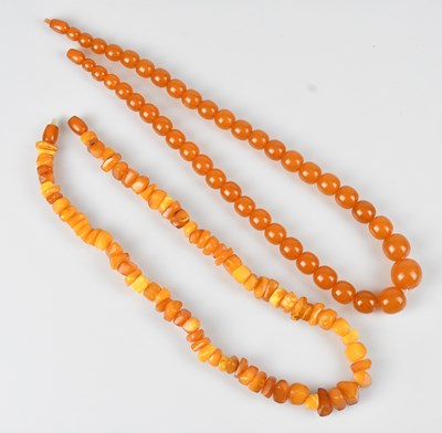Lot 339 - A Baltic amber necklace, length 480mm, and an...