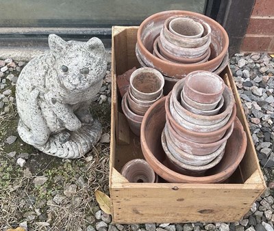 Lot 905 - Terracotta pots together with a reconstituted...