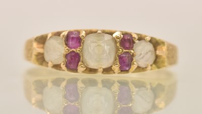 Lot 1263 - A 15ct yellow gold dress ring, with three...