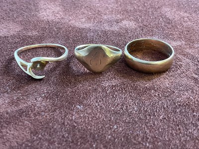 Lot 597 - Three gold rings, two 9ct yellow gold,...