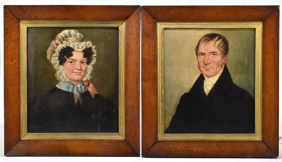 Lot 1416 - A pair of 19th century oils on canvas, a portrait of a gentleman wearing a black overcoat and a lady