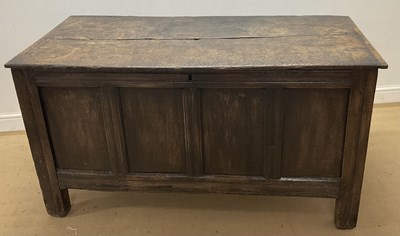 Lot 817 - A 17th century oak coffer, the front with four...