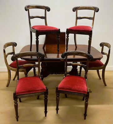 Lot 799 - A 20th century mahogany dining table with...
