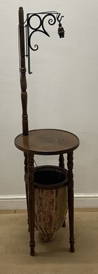 Lot 845 - An oak circular sewing table, with integral...