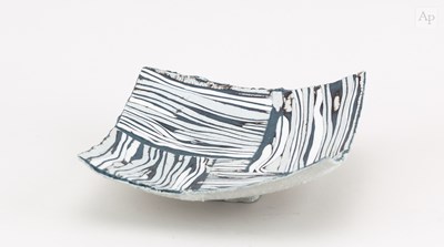 Lot 357 - MAGGIE BARNES (born 1940); a square dish made...