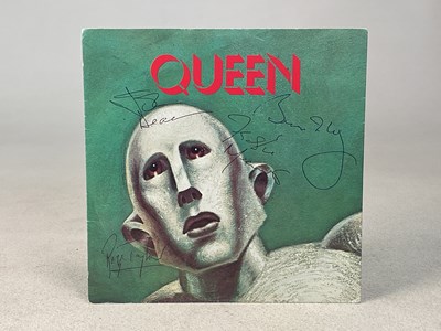 Lot 41 - QUEEN; a 45rpm A side 'We will Rock You', B...