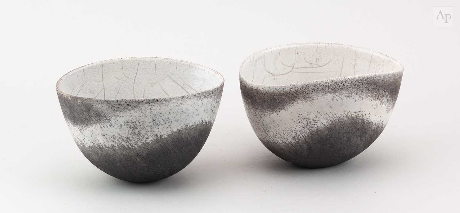 Lot 27 - ANNE JAMES (1937-2025); a pair of raku bowls...