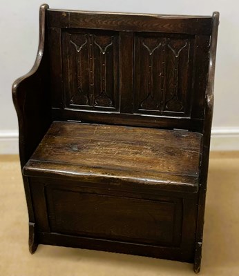 Lot 832 - A late 18th century oak monk's bench of small...