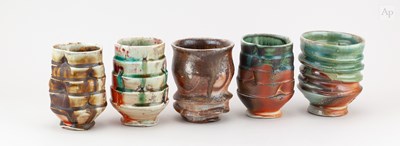 Lot 38 - BEN BATES; a group of five ribbed wood fired...