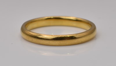 Lot 536 - A 22ct yellow gold wedding band, size L, 3.09g.