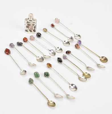 Lot 244 - A set of eighteen white metal and coloured...