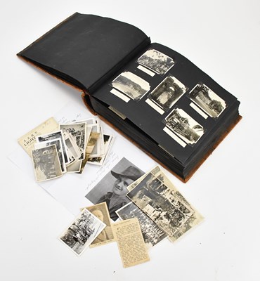 Lot 569 - A photograph album containing images of...
