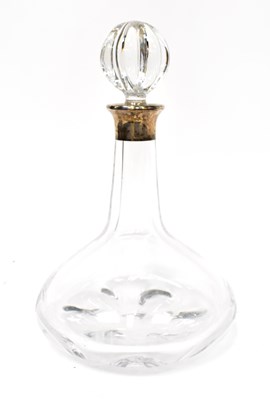 Lot 856 - A crystal ship's decanter with silver collar,...