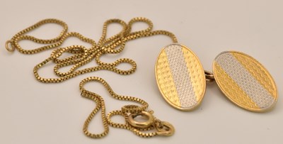 Lot 1181 - An 18ct yellow and white gold oval face...