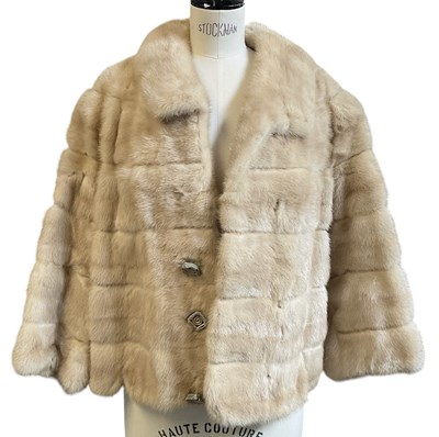 Lot 473 - An early 20th century white rabbit fur jacket,...