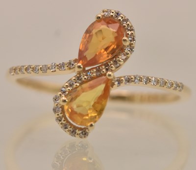 Lot 1220 - A 14ct yellow gold natural yellow sapphire and...