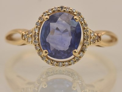 Lot 1221 - A 14ct yellow gold sapphire and diamond set...